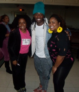 Why We Dance Director Candace Waller and Yateesha Davis pose with William "Willdabeast" Adams.